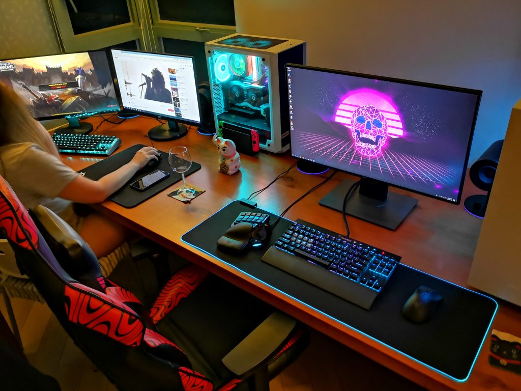 Couples gaming desk setup.